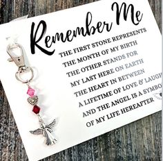 a keychain with a poem on it that reads, remember me the first stone represents the month of my birth