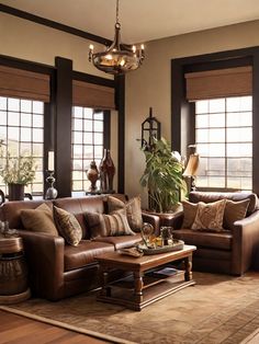 a living room filled with furniture and lots of windows