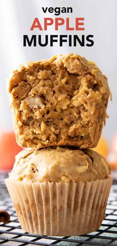 two muffins stacked on top of each other with the title vegan apple muffins