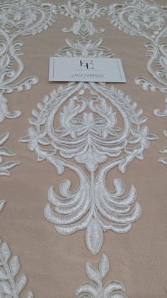 Ivory lace fabric. Both sides scalloped.Width: 135 cm/53.1 inchesItem number: EVS150CPrice is set for one meter/yard. You will receive the fabric in one continuous piece if you purchase more than 1 meter/yard. Elegant Cream Lace Fabric And Notions, White Scalloped Lace Embroidered Fabric, White Embroidered Fabric With Lace Trim, Elegant Embroidered White Tulle Fabric, Elegant White Embroidered Fabric And Notions, White Embroidered Fitted Fabric With Lace Trim, Elegant White Lace With Intricate Embroidery, Fitted White Embroidered Fabric With Lace Trim, Elegant White Embroidered Tulle Fabric