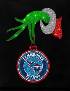 an ornament hanging from the side of a christmas tree with minnesota titans logo on it