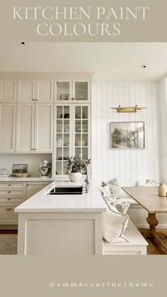 a kitchen with white cabinets and wood flooring is featured in the magazine paint color tip