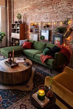 a living room filled with lots of furniture next to a fire place in a brick wall