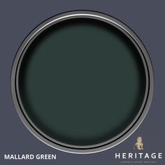 a round metal object with the words, mallard green