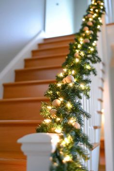 christmas garland on the stairs with lights