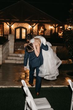 the bride and groom are walking down the aisle