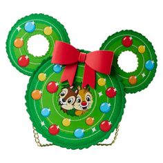 Branch Out In Festive, Holiday Style With This Loungefly Disney Chip And Dale Figural Crossbody Bag. It's Perfect For Dashing Off To All Your Favorite Holiday Gatherings. On The Front Of This Figural Bag, Which Is Shaped Like A Wreath, With Mickey Mouse Ears, You'll Find Chip And Dale's Adorably Mischievous Faces Peeking Out From The Middle Of The Wreath. Sparkling Ornaments In Brilliant Colors Come To Life In Applique Detail. In Fact, Layers Of Applique And Embossing Create Depth And Texture Fo Dr. Suess, Disney Chip And Dale, Disney Chip, Wreath Cross, Chip N Dale, Loungefly Bag, Disney Handbags, Chip And Dale, Disney Fashion