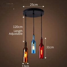 three lights hanging from the ceiling with measurements