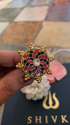 Silver Jewellery at its best! A gorgeous real silver ring with beautiful multicoloured Kundan work. Love the beautiful colour combinations Pick it up and make a stunning statement! Material: 92.5 pure silver with 22 k gold plating Hallmarked Size Adjustable Multicolor Flower Ring For Wedding, Multicolor Flower Ring As Gift, Multicolor Flower Ring Gift, Traditional Multicolor Wedding Rings, Traditional Multicolor Rings As Gift, Traditional Multicolor Rings For Gifts, Temple Jewelry Style Round Rings For Celebrations, Multicolor Hallmarked Rings For Gifts, Fusion Style Multicolor Wedding Rings