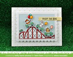 a close up of a card with an animal on a roller coaster and balloons in the air