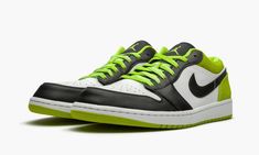 The Air Jordan 1 Low “Black/Cyber” finds Michael Jordan’s iconic first signature shoe in low-top form in an all-new colorway released in 2020. The “Black/Cyber” look reimagines the design of the Jordan 1 Low by incorporating a lime green dotted suede material around the collar and heel. Smooth white leather appears as the base of the shoe on the perforated toe and mid-panel. The forefoot, eyelets, and Swoosh branding on either side are finished off in black leather. Other details include a black Air Jordan 1 Low Black, Womens Air Jordans, Air Jordan 1 Low, Jordan 1 Low, Suede Material, Sneaker Collection, Black Nylons, Michael Jordan, Air Jordan 1