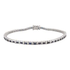 This is part of Chairish’s Fine Jewelry assortment.  This Stacking Alternate Blue Sapphire Diamond Tennis Bracelet in 18K gold showcases endlessly sparkling natural blue sapphire of 1.79 carats and 1.25 carats diamonds. It measures 7.5 inches long in length.  Sapphire stimulates concentration and reduces stress.  Designed with perfect square cut blue sapphire set with a diamond alternatively to make you stand out on any occasion or event. The elegant style complements the attire beautifully and Timeless Blue Bracelet For Formal Occasions, Luxury Sapphire Gemstone Tennis Bracelet, Blue Diamond Cut Bracelet For Formal Occasions, Luxury Sapphire Tennis Bracelet For Formal Occasions, Luxury Sapphire Bracelet For Formal Occasions, Sapphire Bracelets For Formal Occasions, Formal Blue Diamond-cut Bracelet, Formal Blue Diamond Cut Bracelet, Formal Sapphire Tennis Bracelet In Fine Jewelry Style