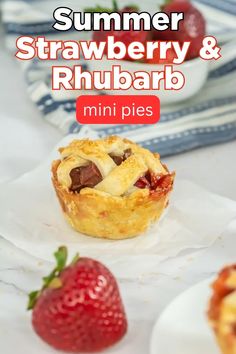 a strawberry and rhubarb mini pie is shown with strawberries in the background