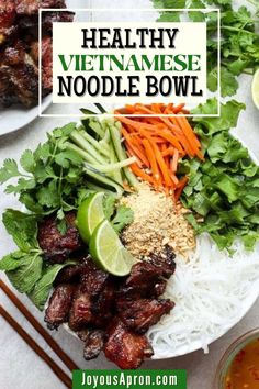 healthy vietnamese noodle bowl with meat and vegetables