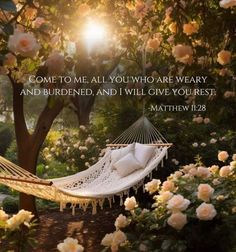 a hammock in the middle of roses with a bible verse