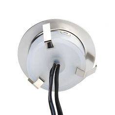 two wires are connected to the inside of a recessed light fixture with an extension cord