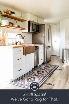 a kitchen with white cabinets and stainless steel appliances is featured in the article small space? we've got a rug for that