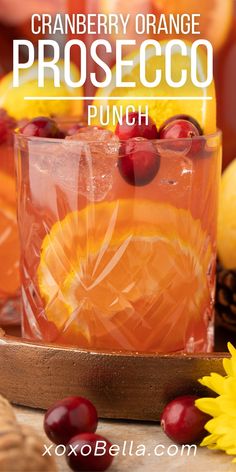 Cranberry orange prosecco punch is a fun Fall or Thanksgiving cocktail. The orange and cranberry flavours make it festive and fruity, while the prosecco gives it a wonderful amount of fizz. Thanksgiving punch is a great festive drink to serve to guests or you could simply make a pitcher to enjoy over the Thanksgiving period. Cranberry orange prosecco punch is perfect as a fall or Thanksgiving cocktail. The holiday punch is a festive drink which looks pretty and tastes delicious. Sparkling Fall Cocktails, New Year’s Eve Pitcher Drinks, Sparkling Thanksgiving Cocktail, Sparkling Cider Punch Non Alcoholic, Foods That Are Orange, Thanksgiving Holiday Drinks Alcohol, Cranberry Pitcher Cocktail, Fall Punch With Alcohol, Thanksgiving Champagne Punch