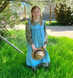 "Girls Anne's Dress Set Do you have an Anne of Green Gables fan at your house? Our Anne's Dress set is a wonderful costume dress set that your girl will want to wear over and over. This dress set was created in order to replicate the look of Anne's first days at Green Gables. The long dress comes standard with long sleeves finished with a bit of elastic, a round peter pan collar and back zipper. If you would prefer short sleeves, just let me know when you check out. It has a natural waist length Peasant Style Cotton Costume Dress, Spring Cottagecore Costume Dress, Cottagecore Fitted Costume Dress, Murrells Inlet Sc, Girls Costumes, Murrells Inlet, Polycotton Fabric, Anne Of Green, Anne Of Green Gables