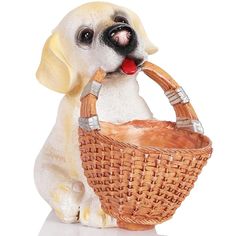 a dog figurine holding a basket with its mouth open and tongue hanging out