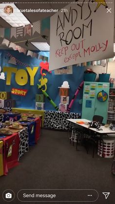 a classroom with toys and decorations on the walls