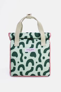 a green and pink lunch bag with question marks on it