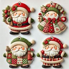 four christmas ornaments with santa claus and other decorations