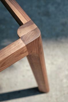 a close up view of a wooden bench