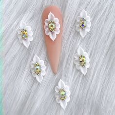 4pcs/bag - handmade 3D flowers acrylic for nails White color with AB rhinestone color Easy to apply Very fast to stick on finished nail set, just need rhinestone glue and glue it on. They are made by acrylic nail powder 3d Nail Flowers Acrylics, Nails Plain, 3d Acrylic Nails, Nail Flower, Black And White Nail Art, Nails Flower, 3d Nail Designs, 3d Nail Art Designs, Thanksgiving Nail Art