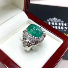 "ENJOY OUR WORRY-FREE SERVICE AND THE DAZZLING, GENUINE JEWELRY WE DESIGN AND HANDCRAFT WITH LOVE❤️ ABOUT THE ITEM: This ring takes PRESTIGE to a whole new level. With VIVID, TOP GRADE, CERTIFIED, TRANSPARENT 7.35 carats, Classy oval cabochon cut, Zambian emerald, with vivid green color extremely similar to that from Colombia. Surrounded by 36 pieces of STUNNING & SPARKLING, natural diamonds. Set in a CUSTOM-DESIGNED, unisex, solidly handcrafted HEAVY 18K solid white gold ring. SUGGESTED RET Zambian Emerald, Vs Diamond, Free Service, Unisex Ring, White Gold Engagement Rings, White Gold Ring, Pure Gold, Natural Emerald, Emerald Diamond