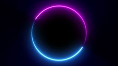 a neon circle on a dark background