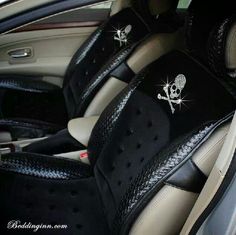 the interior of a car with skulls and crossbones on it