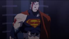 a man dressed as superman in the dark