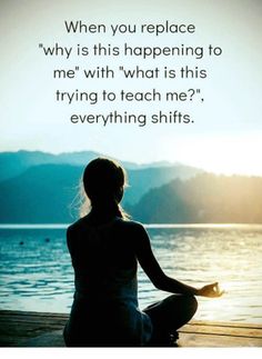 a woman is sitting on the dock and meditating with her hands in yoga position