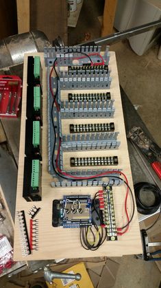 the electronic components are laid out and ready to be built into something else that looks like it's made from wood