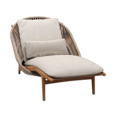 an outdoor lounge chair with two pillows on it's back and the seat upholstered