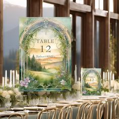 a table is set up with place cards and candles for an outdoor wedding in the mountains