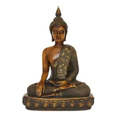 a buddha statue sitting on top of a wooden base