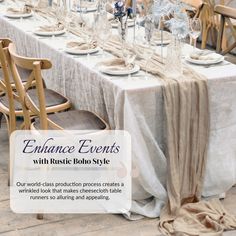 the table is set for an event with white linens and silverware on it