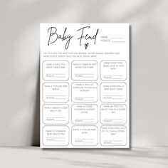 the baby food list is shown in black and white, on a table next to a gray wall