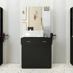 a bathroom with black cabinets and a mirror on the wall next to it's doors