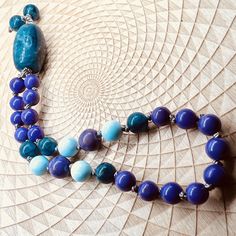 This 27 bead pocket mala is made from 6mm natural gemstone beads, it is hand knotted on silk thread, and is one of a kind. Please note this mini mala is not intended to be worn as a bracelet as it is hand knotted on silk. It is neither elastic nor does it have a clasp. These mala beads are intended for prayer and meditation.  Phosphosiderite is an excellent stone for connecting with your spirit guides, and it can help you access past life memories. Interestingly, Phosphosiderite can help you bre Turquoise Agate Round Beads For Crafting, Turquoise Agate Round Beads, Gems And Cabochons, Turquoise Agate Round Beads Gems And Cabochons, Blue Natural Stone Beads For Meditation, Blue Natural Stones Beads For Meditation, Past Life Memories, Ties That Bind, Les Chakras, Crystal Meanings