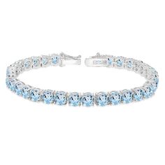 Wear this stylish bracelet to enhance your daytime and evening attire. This attractive tennis bracelet displays 5mm round cut gemstones in a polished prong setting that is perfect for evening wear and statement pieces. The bracelet is crafted of fine sterling silver and is nickel & tarnish free. It measures 7.25 inches and secures by box and tongue plus a safety latch. This gem bracelet in fine jewelry is a great addition to your tennis bracelets and gemstone jewelry collections. Product Det Bracelet Displays, September Birthstone Rings, Fake Nose Rings, Blue Topaz Bracelet, Gems Bracelet, Bracelet Display, Stylish Bracelet, Sapphire Bracelet, Pretty Bracelets