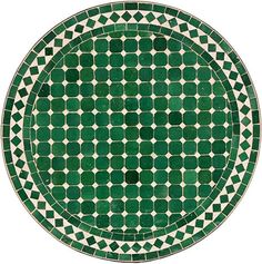 a green and white plate sitting on top of a table