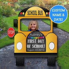 a yellow school bus with a child's photo on the front