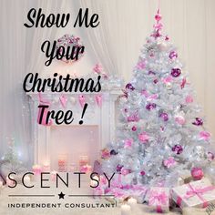 a white christmas tree with pink and silver decorations