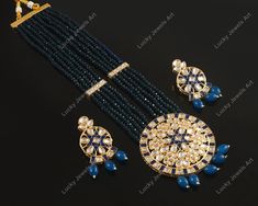 This is a stunning hand painted necklace perfect for high end Jewelry Collector, a keeper in Traditional Vintage Indian/Pakistani Bridal jewelry and a Luxury Gift for your Daughter, Sister or Wife on Wedding or Anniversary. Perfect for any type of occasions, weddings And celebrations and a beautiful & memorable gift for weddings and special occasions. -Item Code:-M73 -Rajwada Necklace Set with Earrings. -Designer multi layered blue beaded necklace with hand painted pendant. -Gold Plated Set with kundan which shine like precious stones. -Metal: Gold plated brass -Earrings are 55mm long & 28mm wide approx -Push Back Earrings -Necklace length with pendant 11" approx excluding adjustable dori/cord -Quantity:- One Necklace Set Please see more different designs here:- https://www.etsy.com/in-en/ Luxury Blue Kundan Necklace For Weddings, Blue Temple Jewelry Bridal Necklace With Meenakari, Blue Meenakari Bridal Necklace In Temple Jewelry Style, Traditional Blue Jewelry For Reception, Traditional Blue Beaded Necklaces For Celebrations, Blue Kundan Necklace With Meenakari Details, Traditional Blue Beaded Necklace For Celebrations, Blue Chandbali Bridal Necklace Gift, Blue Bridal Necklace In Temple Jewelry Style With Meenakari