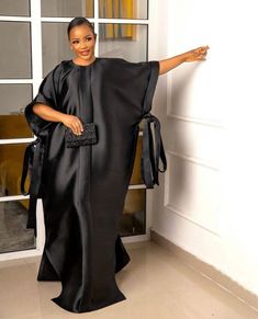 Beautiful black silk dress.Perfect attire for that simple and classy look, suitable for evening wear, beach wear, summer dress etc. Kindly attach the following measurements when ordering for a perfect fit . Available in other colors too. Bust Waist Hips Dress Length Shoulder Thank you for shopping💖. Luxury Black Silk Kaftan, Luxury Black Kaftan For Evening, Luxury Elegant Dola Silk Gown, Luxury Black Kaftan For Party, Luxury Elegant Dola Silk Dresses, Gomesi Dress, Mikado Silk, Materials Gown Style, Boubou Dress