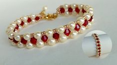 a white bracelet with red and white pearls on it, next to a gold plated ring