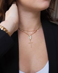 "Here's to jewelry with meaning. Stay in trends with everyday pieces that are affordable, quality, handmade and beautiful. ✤ Available in 14k Gold Filled or Sterling Silver ✤ Medallions & Pendants are Gold Filled or Sterling Silver ✤ Gold filled or Sterling silver Figaro chain ✤ Dainty Virgin Mary and cross charm drop measures abut 55mm ✤ Available sizes * Please choose in drop down box * - 14\", 16\", 18\" and 20\" ✤ Model is wearing size - 14\" with 2.2\" drop (mary and cross drop) ✤ Pleas 14k Gold Filled Cross Jewelry Gift, Delicate Clavicle Chain Jewelry With Cross Pendant, Delicate Clavicle Chain With Cross Pendant, Dainty Cross Pendant Charms Jewelry, Everyday Gold Plated Cross Pendant Necklace, Delicate Everyday Cross Pendant Jewelry, Gold Plated Cross Necklace As A Gift, Everyday 14k Gold Filled Cross Pendant Necklace, Everyday Gold Plated Cross Jewelry